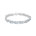 16.0 CTW Oval Blue Topaz & Diamond Accent Tennis X Link Bracelet in 925 Sterling Silver (I–J / I1–I2)