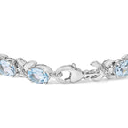 16.0 CTW Oval Blue Topaz & Diamond Accent Tennis X Link Bracelet in 925 Sterling Silver (I–J / I1–I2)